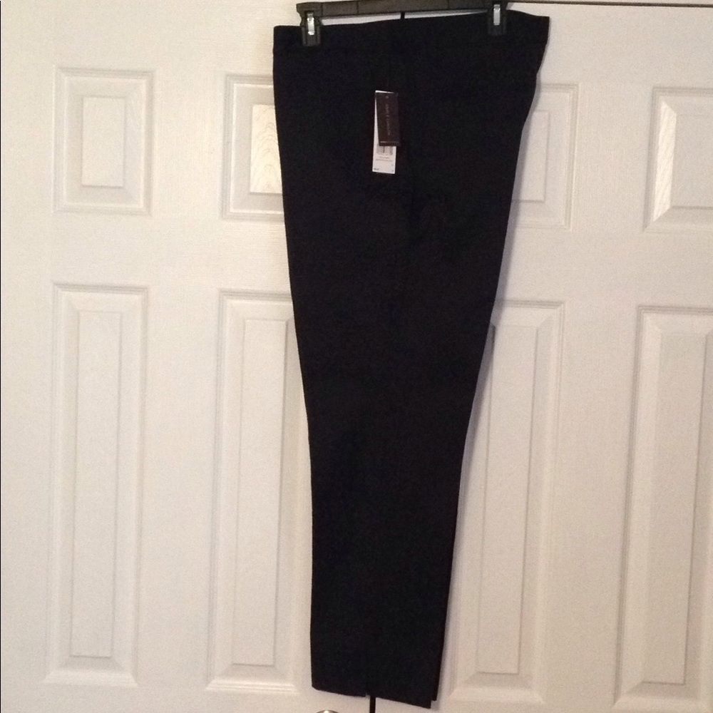 tapestry design . leather trim waist band .